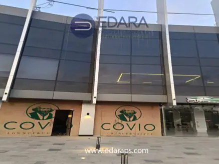 Facade of COVIO Lounge and Coffee with large glass windows and logo displayed prominently.
