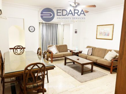 Combined living and dining room with classic furniture – Maadi apartment by Edara Property Services