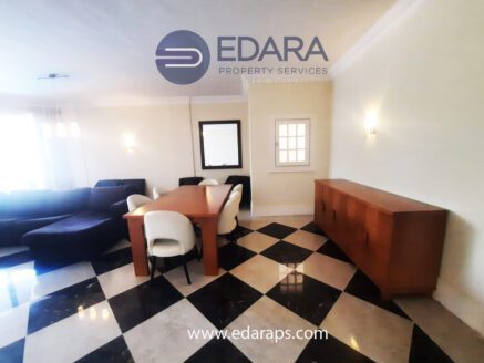 Reception with dining area and wooden cabinet – Edara Property Services